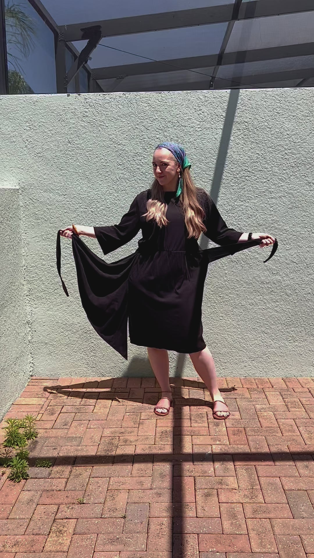short how to video on how to tie a modest faux wrap dress